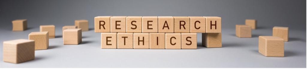 Stacked wooden blocks spelling out 'Research Ethics'